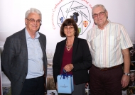 Brendan O'Sullivan, chairman, IPF AV Group Committee, presenting Bev & Alan Tyrer with a memento as judges of the 36th IPF AV Nationals & 1st Photo Harmony competition, 21st October, 2018.