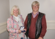 Edwin Bailey presenting Joan O\'Neill with her silver medal as winner of the Novice Section, IPF AV Nationals at Shannon Camera Club, 22nd October, 2018.