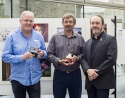 Ross McKelvey and Steve Cullen from Creative Photo Imaging Club and IPF President Michael O'Sullivan pictured with their winning colour panel.jpg