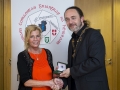 IPF President Michael O'Sullivan presenting individual colour bronze medal to Judy Boyle.jpg