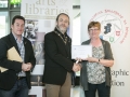 IPF President Michael O'Sullivan presenting 3rd Place Monochrome Club Award to Malahide Camera Club accepted by Catherine Bushe and Joe Doyle