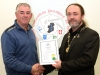 IPF President Michael O'Sullivan presenting Thomas Quiltywith his LIPF distinction