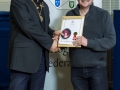 IPF President Michael O'Sullivan presenting FIPF distinction to Arthur Carron.jpg