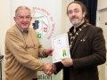 IPF President Michael O'Sullivan pictured presenting LIPF distinction to John Tait