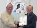 IPF Distinctions Chairman pictured presenting LIPF distinction to Roger Eager