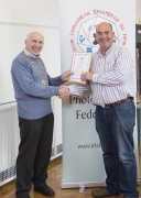 IPF Vice President Sheamus O'Donoghue presenting fellowship distinction to Gerry Kerr