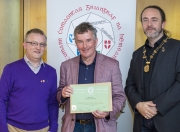 IPF President Michael O'Sullivan & IPF FIAP Liaison Officer Paul Stanley presenting EFIAP/platinum distinction to Tony McDonnell