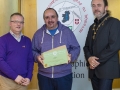 IPF President Michael O'Sullivan & IPF FIAP Liaison Officer Paul Stanley presenting AFIAP distinction to Paul Reidy.jpg