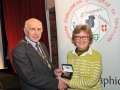 Sheamus O'Donoghue presenting Margaret Finlay with the Audience Vote bronze medal