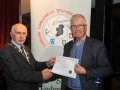 Sheamus O'Donoghue presenting Pat Collins with his Honourable Mention Certificate in the Novice section