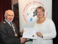Sheamus O'Donoghue presenting Yvonne Acheson with her Honourable Mention certificate in the Advanced Section