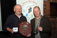 IPF President Dom Reddin presenting Michael Linehan with a silver medal in the Intermediate Section, the best 1st time entrant and the best photography trophy