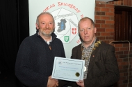 IPF President Dom Reddin presenting Michael Linehan with an Honourable Mention Certificate