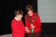 Rita Nolan receiving the best photography ribbon on behalf of Celbridge Camera Club at the Irish Open section of NIPA AV 2017.