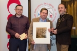 IPF President Michael O'Sullivan and Shane Cowley from Canon Ireland pictured with overall winner Bill Power and winning image