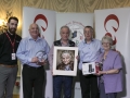 Philip Desmond from Canon Ireland, judges Sandy Cleland, Leo Palmer and Peter Gennard along with IPF Vice-President Lilian Webb pictured with overall winning image and some of the prizes its author receives.jpg Philip Desmond from Canon Ireland, judges Sandy Cleland, Leo Palmer and Peter Gennard along with IPF Vice-President Lilian Webb pictured with overall winning image and some of the prizes its author receives.jpg